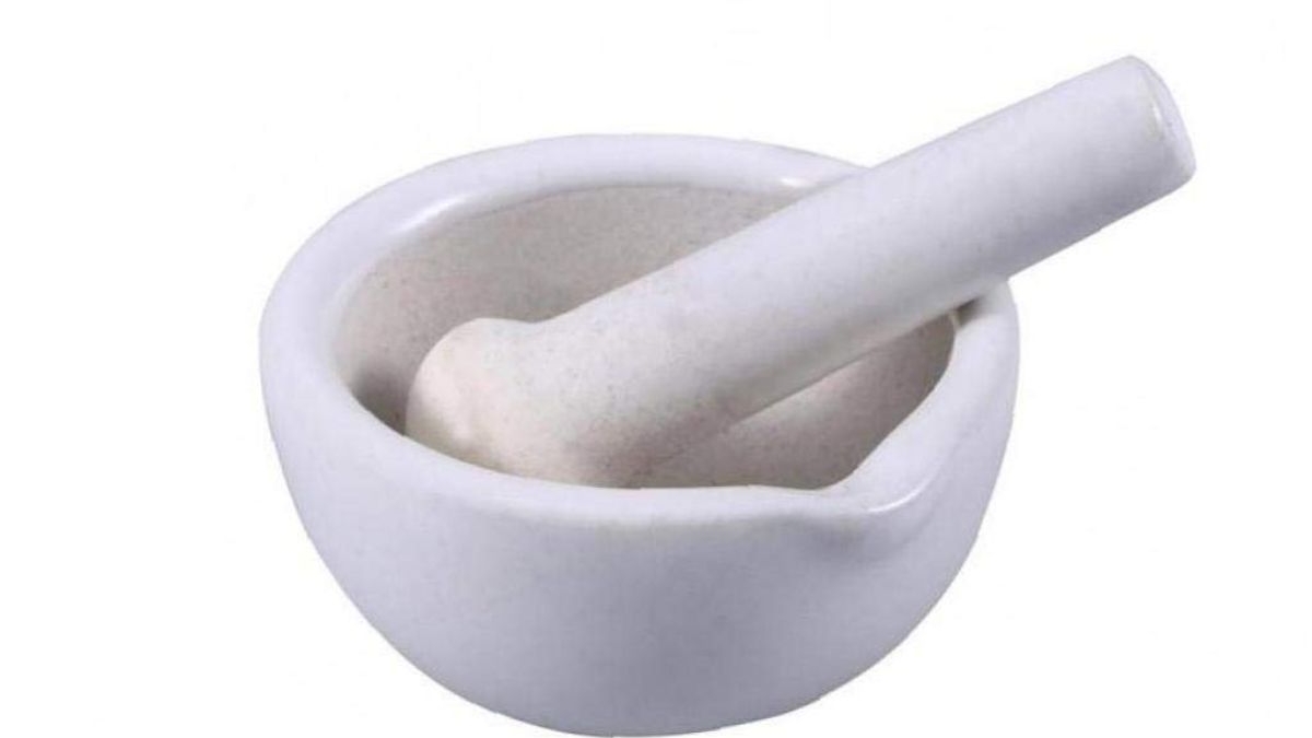 mortar and pestle used to grind pharmaceutical tablets prior to microbiological analysis